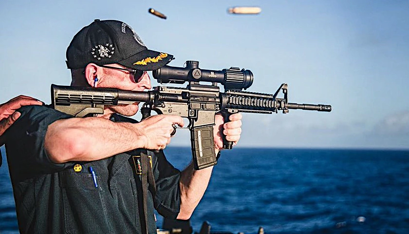 Navy Relieves Officer Once Pictured Shooting Rifle with Backwards Scope from Ship Command