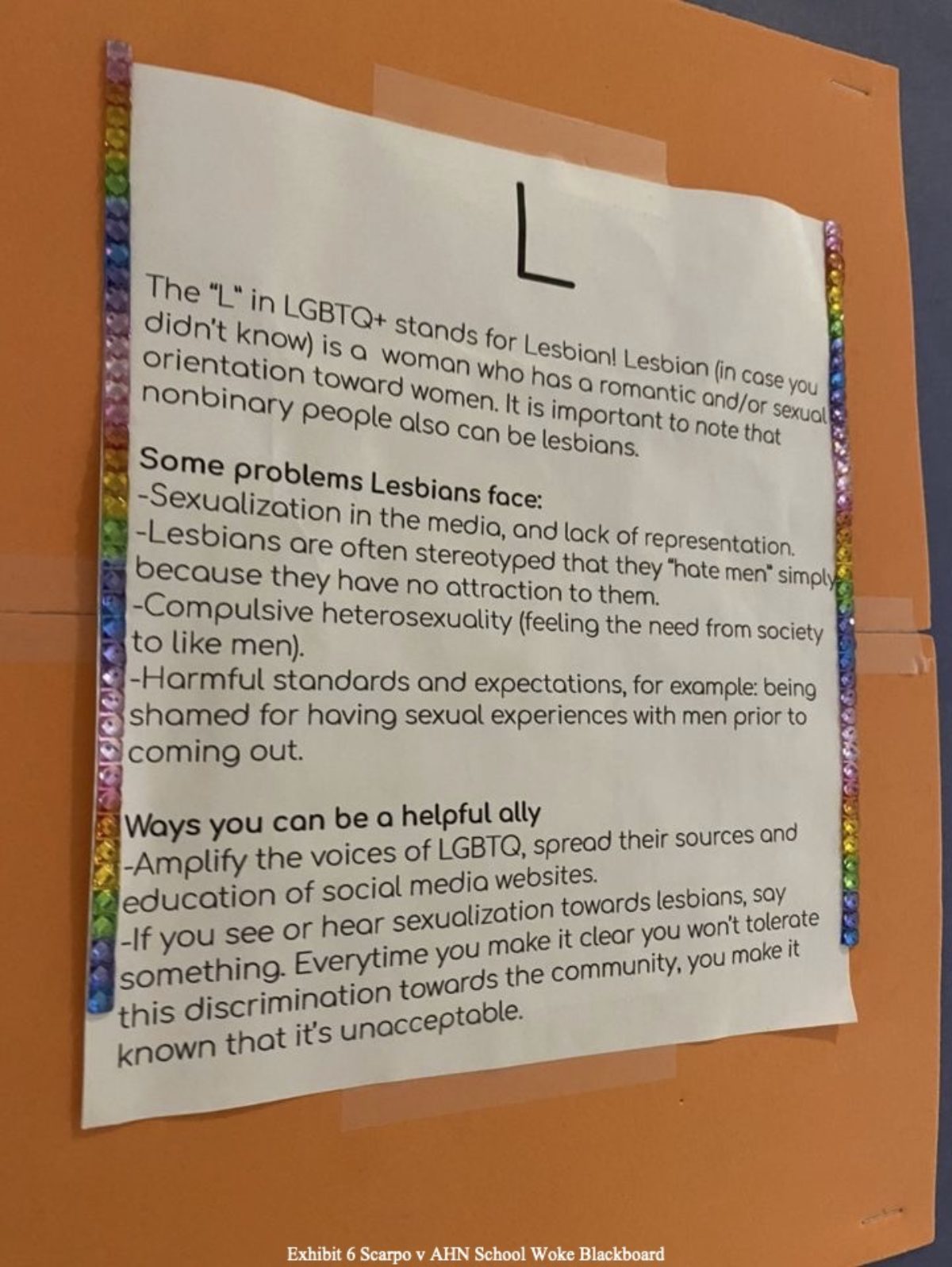 “L” poster on display at the Academy of the Holy Names. Courtesy of Adam Levine from the lawsuit exhibits.