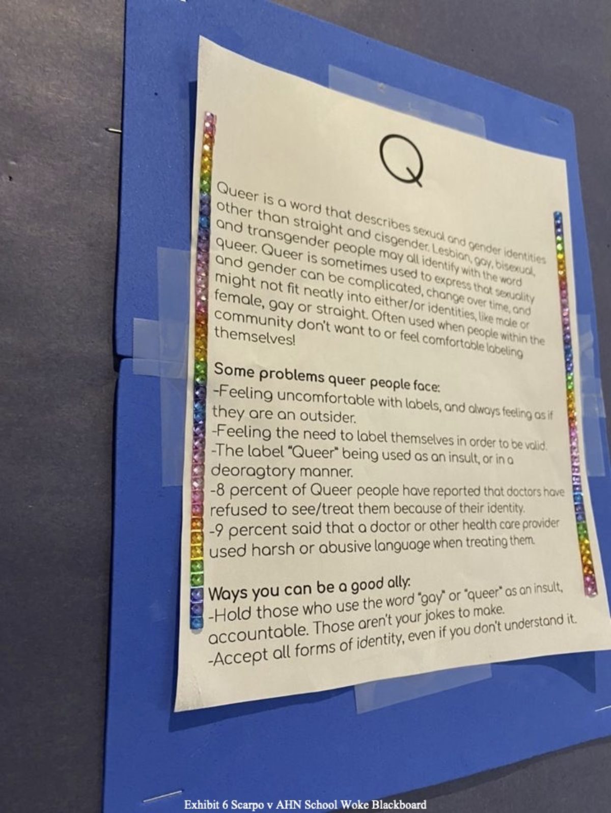 “Q” poster on display at the Academy of the Holy Names. Courtesy of Adam Levine from the lawsuit exhibits.