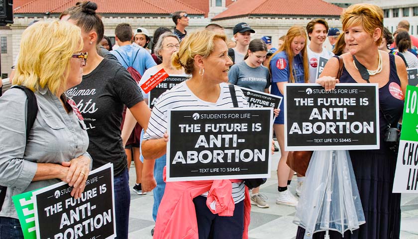 Hundreds of Women Ask Supreme Court to Overturn Roe v. Wade, Citing Abortion Harm