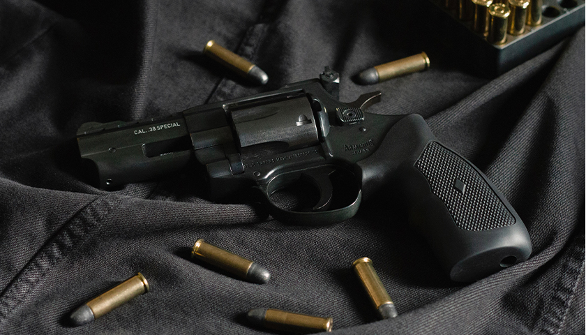 Black revolver with ammo