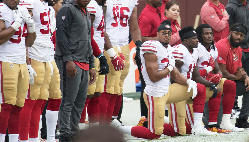 Teachers’ Union Suggests Summer Reading About Kneeling for the National Anthem