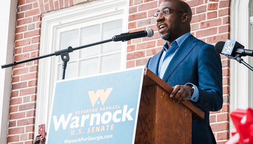 Raphael Warnock Swore off Corporate PAC Money – but Took Thousands from PACs Funded by Big Corporations