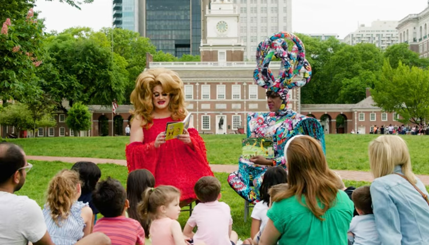 Philadelphia’s New Tourism Ad Draws Parallels Between Drag Queen Story Time and America’s Founding