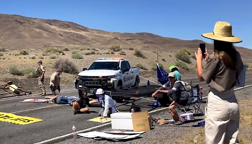 Dramatic Video Shows Law Enforcement Clearing Nevada Highway Blockade, Arresting Climate Activists