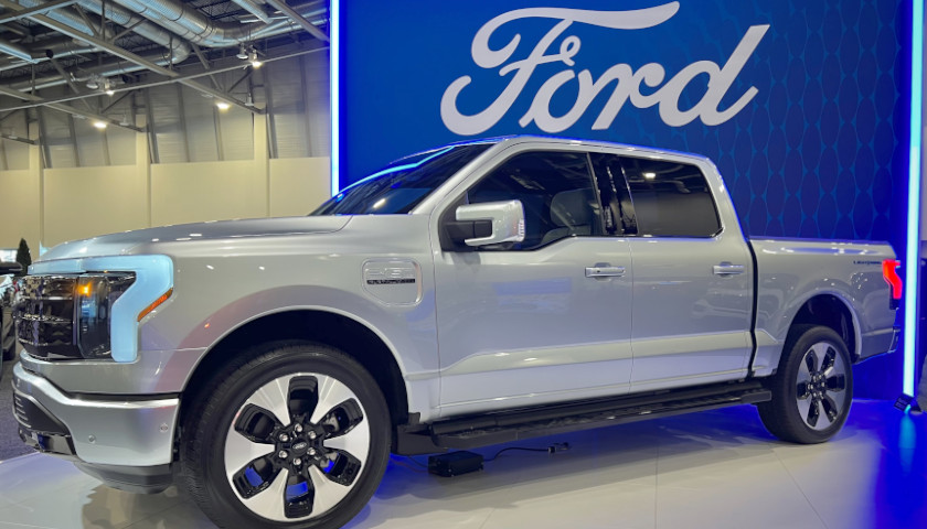 Ford Slashes Production of EV Truck Biden Drove to Promote Green Agenda
