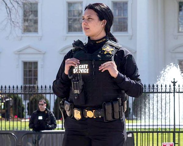 Secret Service Agent standing in front of The White House